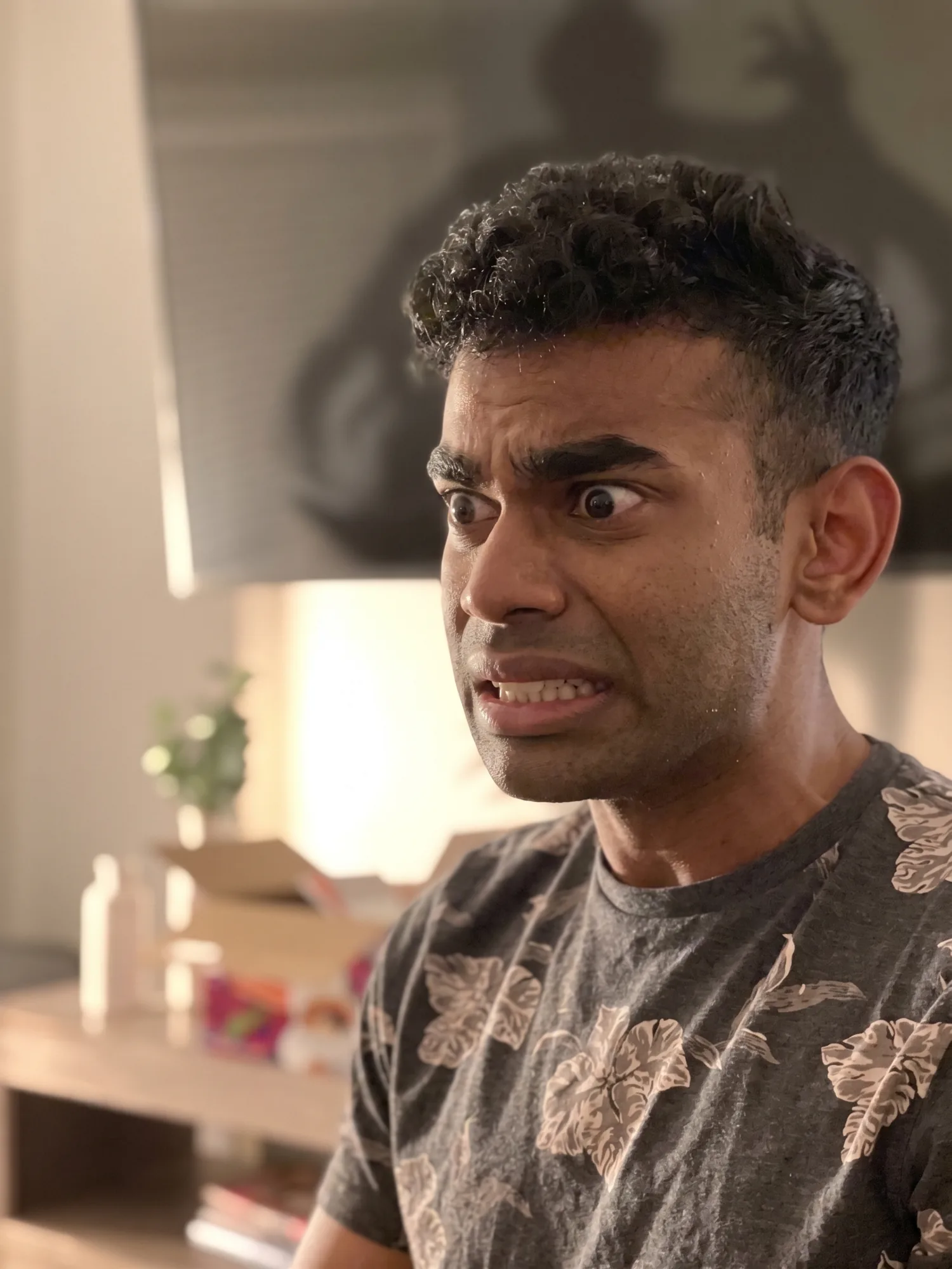 Abhijeet grimacing indoors